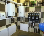 Электрический и газовый котлы Vaillant в котельной гостевого дома. Коллектор котельной Meibes
