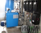 Установка котла Buderus с вентиляторной горелкой