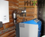 Твердотопливный котел с резервным электрическим