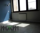 Монтаж радиатора отопления Kermi в комнате частного дома