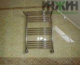 Водяной полотенцесушитель в санузле частного дома